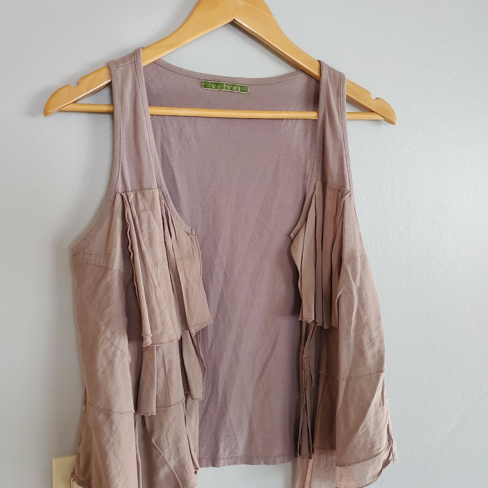 Light purple ruffled vest